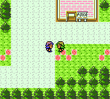 "Pokémon Crystal Version" screenshot of the player character in a town. They are facing another player character sprite with a different color.